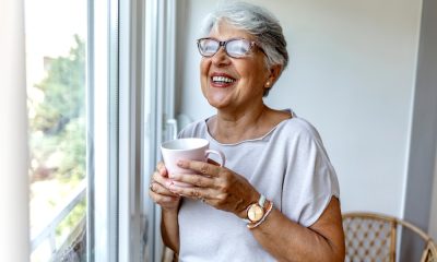 Senior,Woman,Drinking,A,Beverage,At,Home.,Charming,Elderly,Woman